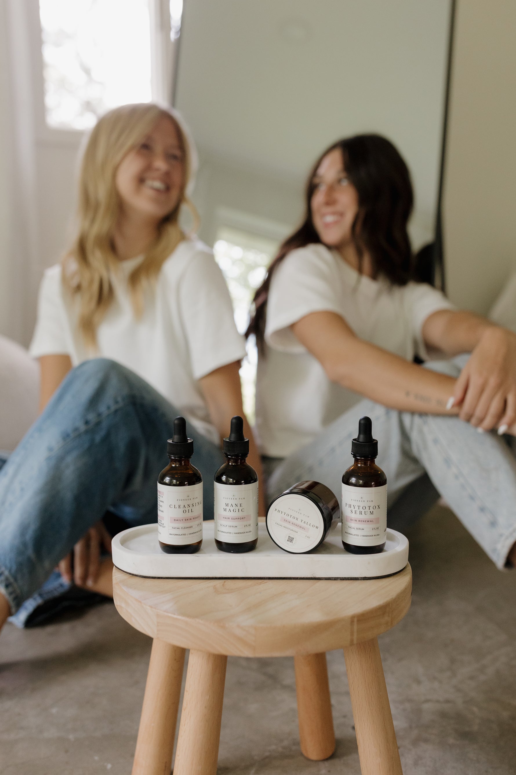 Overhead view of Phytotox Tallow, Mane Magic, and Phytotox Serum from the Total Beauty Bundle