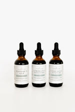 Three Pioneer Pam tincture bottles side by side: Nature's GLP, Lymphatic Tincture, and Liver Detox Tincture from the Detox & Balance Bundle